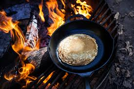 Cooking While Camping: Simple Meals and Fire Safety Tips